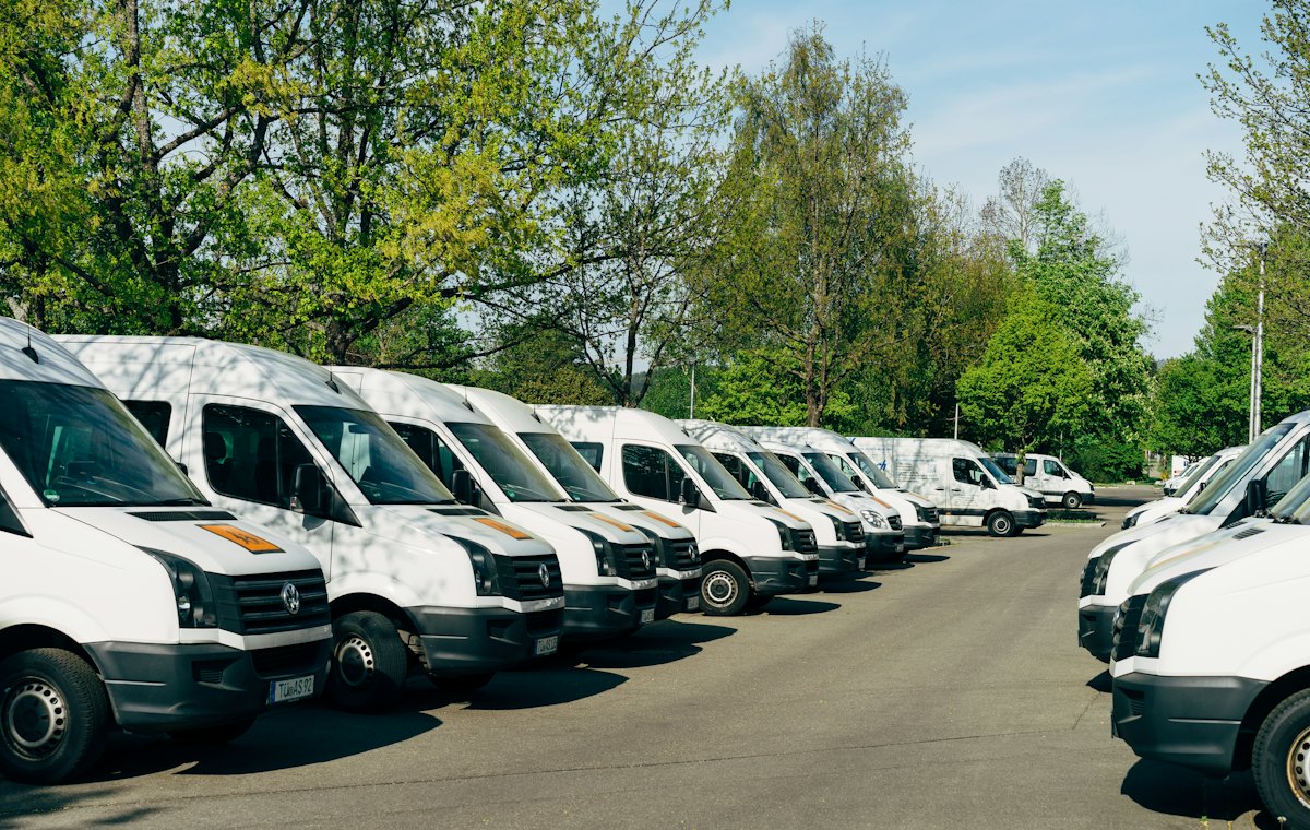White vans parked in a row