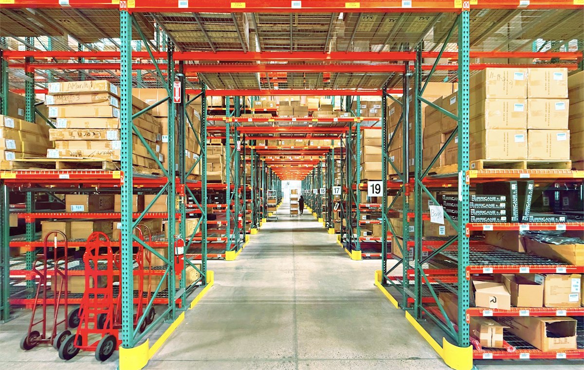 Warehouse shelves stocked with boxes